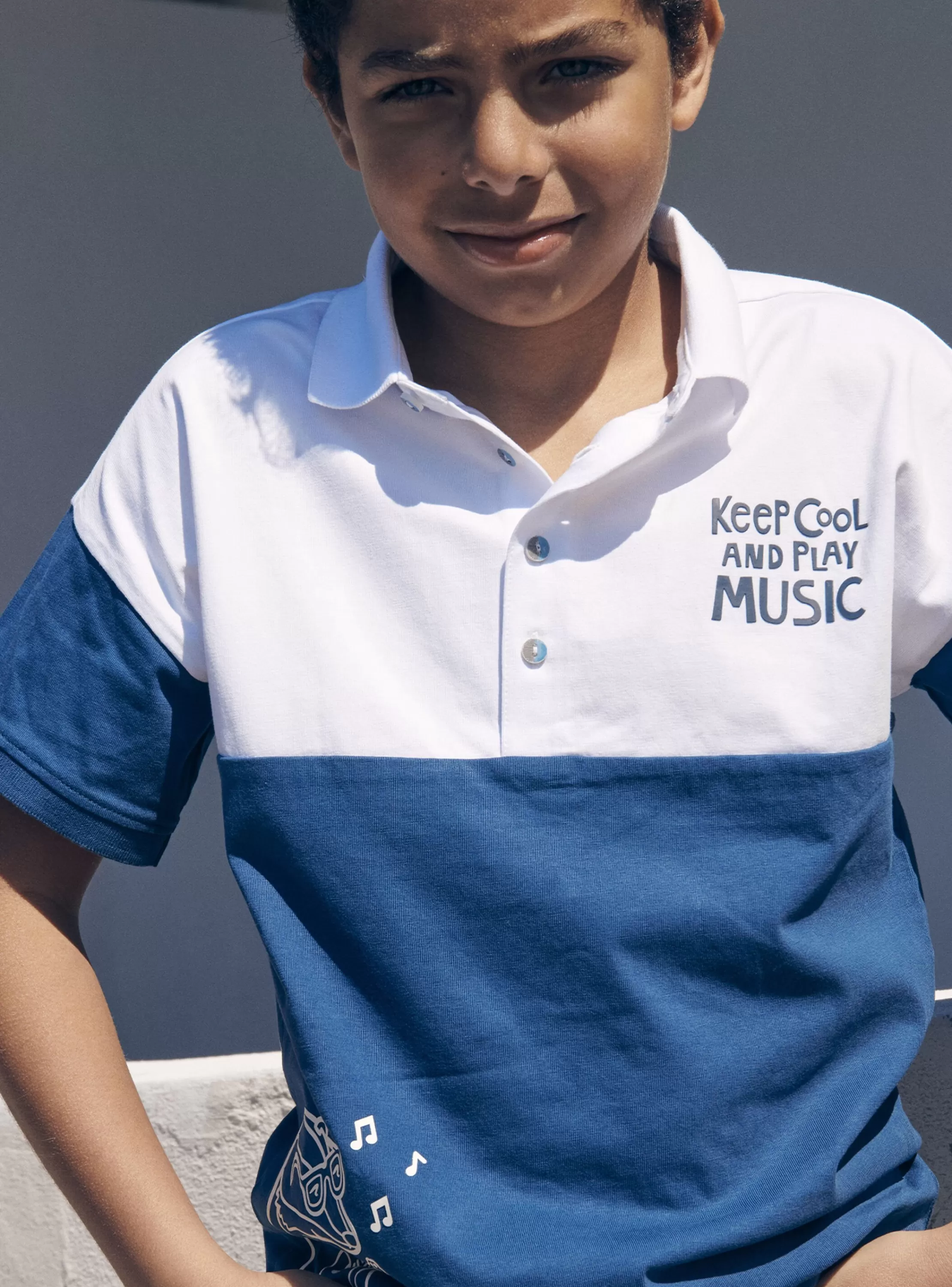 Best Sergent Major Polo bleu et blanc en jersey à motif blaireau guitariste